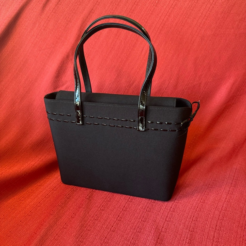 Stuart Weitzman Black Crepe handbag with‎ patent leather details, EUC